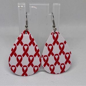 Tear drop breast cancer awareness earrings.
